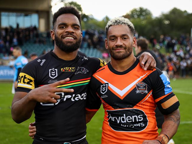 Sunia Turuva (left) reveals a chat with his cousin, Wests Tigers skipper Api Koroisau, convinced him to leave the Panthers. Picture: NRL Imagery