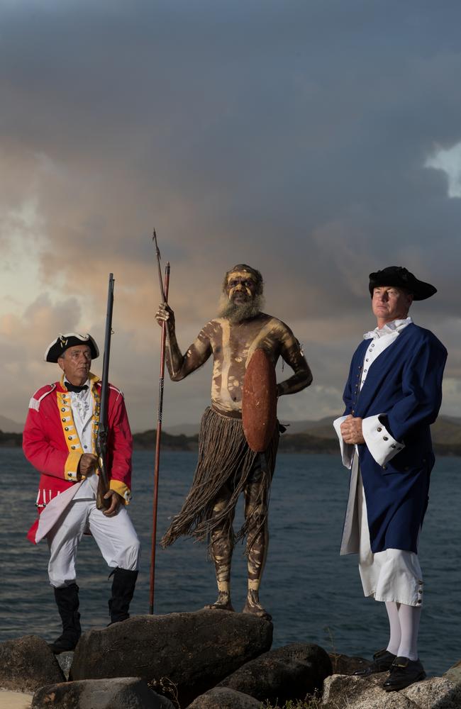 Cooktown Re-enactment Association’s Justin Barr, as Cpt Cook, Fred Deeral, Waymburr Warra traditional owner, and Doug Jene, as a marine, in Cooktown prepare for the 2020 Festival to celebrate the 250th anniversary of the landing of Cpt Cook. Picture: Marc McCormack