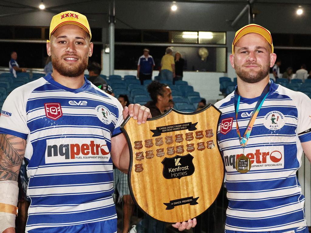 Three times premiership winners Jordan Biondi-Odo and Adam Hepworth pose with the FNQRL A grade premiership shield after beating the Ivanhoe Knights 18 points to 14 in the grand final match at Barlow Park. Picture: Brendan Radke