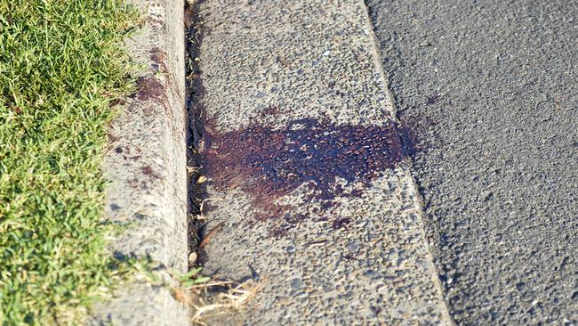 Bloodstains outside the Condell Park wrecking yard. Photo Jeremy Piper