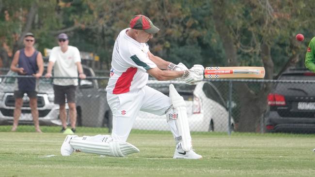 Nick Christides hits a sixin his 400th First XI match. Picture: Valeriu Campan