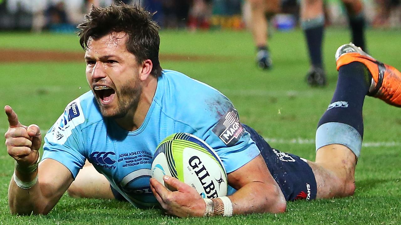 Adam Ashley-Cooper of the Waratahs celebrates scoring a try at ANZ Stadium.