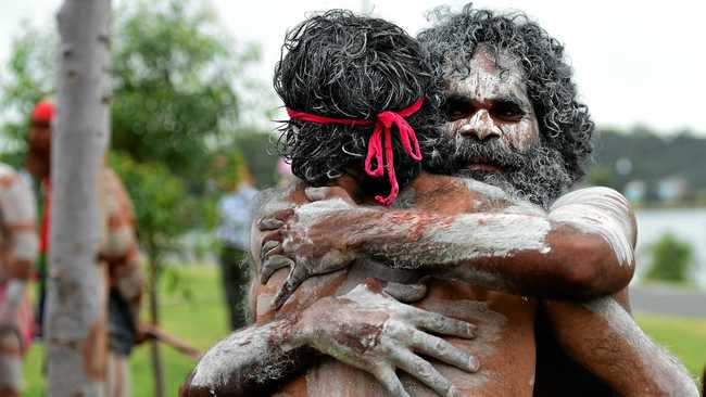 SHOW SOME RESPECT: Aboriginal dancers embrace after performing at Barangaroo Reserve as part of Australia Day celebrations in Sydney last year. Columnist Lesley Apps believes a date change is the least we can do for indigenous Australians. Picture: BRENDAN ESPOSITO