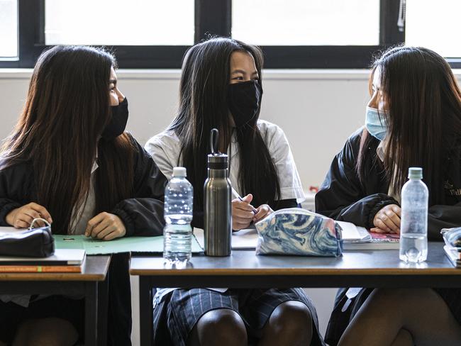 MELBOURNE, AUSTRALIA - OCTOBER 12: Senior students are seen in class at Melba Secondary College on October 12, 2020 in Melbourne, Australia. All primary and high school students in Melbourne are able to return to their classrooms as of today, as part of Victoria's second step in the government's roadmap to reopening. Victoria's coronavirus restrictions were eased slightly across Melbourne from Monday 28 September. Metropolitan Melbourne has been subject to Stage 4 restrictions since 2 August 2020 in response to the re-emergence of COVID-19 in the community. (Photo by Daniel Pockett/Getty Images)