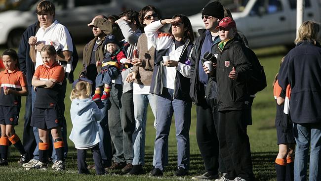 Parents cheer on their children at school sports. Picture: File