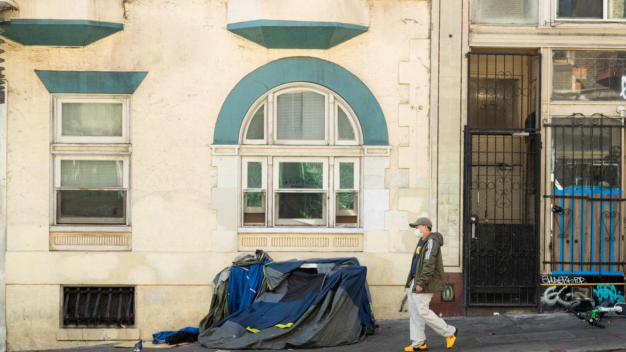 A man walks past a tent on Jones Street in San Francisco, on November 13, 2023. Picture: Jason Henry/AFP