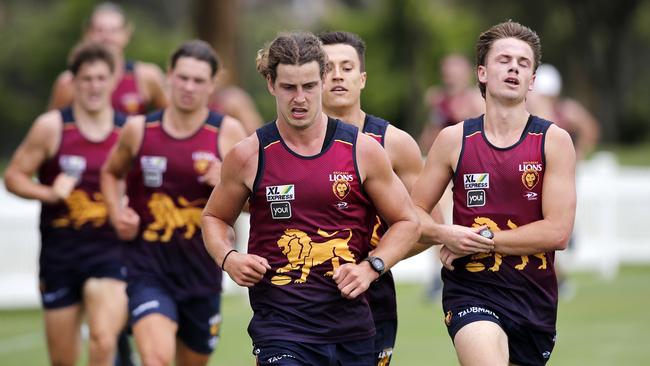 Jarrod Berry leads the young Lions in a pre-season run. Picture: Josh Woning