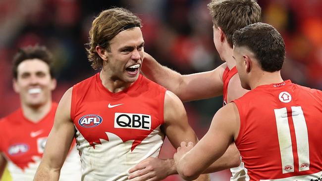 SYDNEY, AUSTRALIA - JUNE 22: James Rowbottom of the Swans and Tom Papley of the Swans celebrate during the round 15 AFL match between Greater Western Sydney Giants and Sydney Swans at ENGIE Stadium, on June 22, 2024, in Sydney, Australia. (Photo by Cameron Spencer/Getty Images)