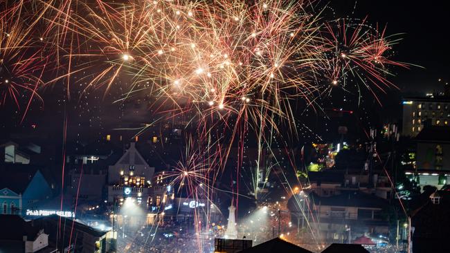 Fireworks illuminate the city's skyline during New Year's Eve celebrations on December 31, 2019 in Yogyakarta, Indonesia. Picture: Ulet Ifansasti/Getty