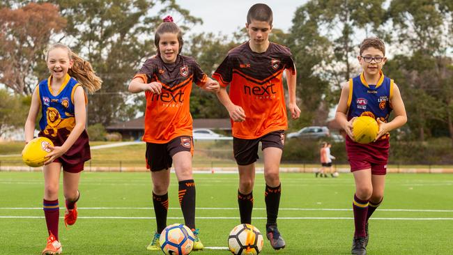 Charlotte Hall (10), Daisy Addison(11), Tai Addison (14) and Josh Cowling (10) enjoy the new facilities at Lionel Watts Reserve in Frenchs Forest. Picture: (AAP IMAGE/Jordan Shields)