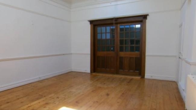 The bare dining room.