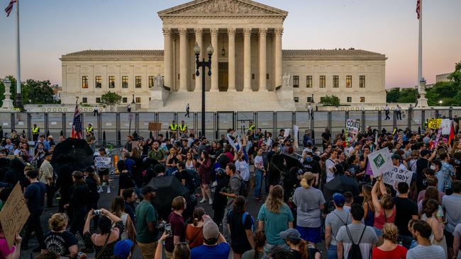 Protesters gathering outside the Supreme Court building in the evening. Picture: Brandon Bell/Getty Images/AFP