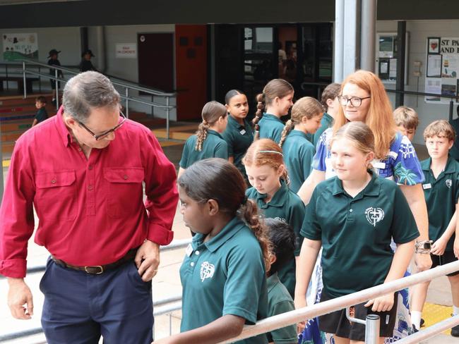 Member for Solomon Luke Gosling walking with St Paul students along new ramp. Picture: government / supplied.