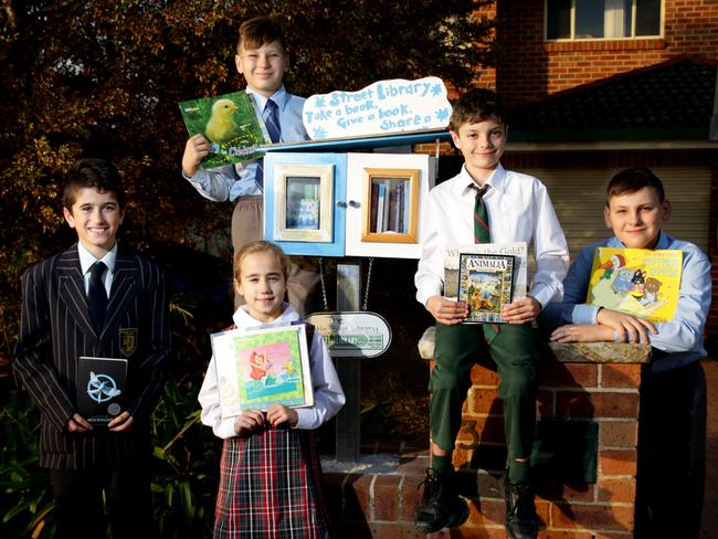 Nimber Porch, Kyle Pace, Boston Smith, Luke Martelli and Matty Martelli love reading.