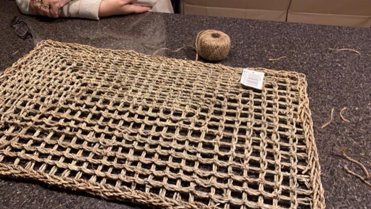 Angela Murie Kearns together with her mother cut a mat in half to create a rectangular shape suitable to the size of the pot. Picture: Facebook/BunningsMumsAustralia