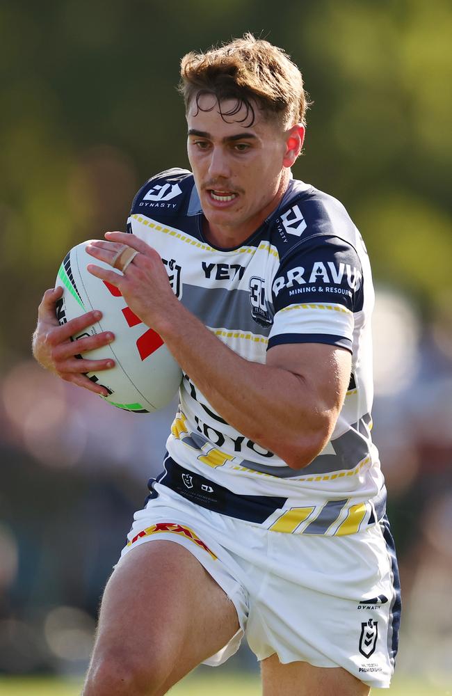 Tom Duffy of the Cowboys runs with the ball during the 2025 NRL Pre-Season Challenge match between Melbourne Storm and North Queensland Cowboys at Casey Fields on February 23, 2025 in Melbourne, Australia. (Photo by Morgan Hancock/Getty Images)