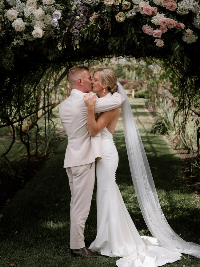 Jamie Kah and Ben Melham share a kiss. Picture: Katie Harmsworth