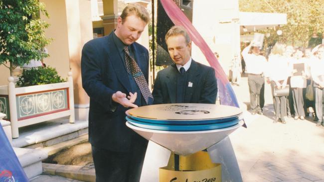 Western Sydney Business Chamber executive director David Borger (left) when he was Parramatta’s youngest Lord Mayor in 2000, with the cauldron at Parramatta.