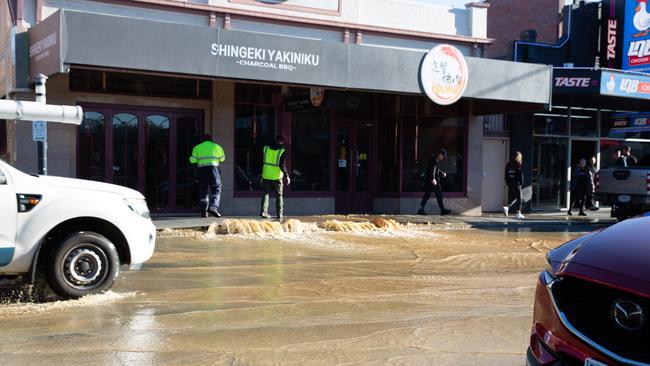 The popular North Hobart restaurant strip has been flooded on Friday July 9, 2021. Picture: JILLIAN MUNDY.