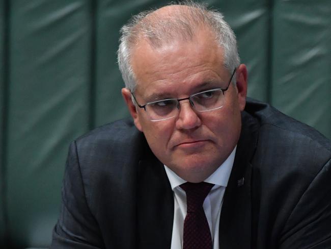 CANBERRA, AUSTRALIA - FEBRUARY 24: Prime Minister Scott Morrison during Question Time in the House of Representatives at Parliament House on February 24, 2021 in Canberra, Australia. Prime Minister Scott Morrison has lost a working majority in parliament after the Member for Hughes Craig KellyÃ¢â¬â¢s resigned yesterday and moved to the crossbench, warning he is prepared to vote against the government. Mr KellyÃ¢â¬â¢s decision to quit the Liberal Party came after the Prime Minister demanded he stop spreading misinformation about COVID-19 and take action against his office manager, Frank Zumbo, who faces allegations of inappropriate behaviour. (Photo by Sam Mooy/Getty Images)