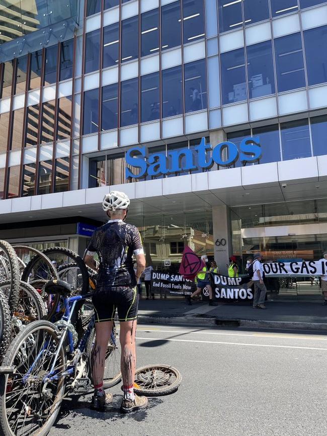 Extinction Rebellion activists protest outside Santos HQ on Thursday, rallying against the company as the TDU sponsor. Picture: Twitter