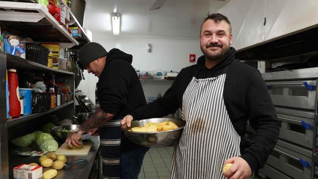 Chefs Adam Richie (left) and Toby Bull (right) are graduates of the centre, and are working towards careers in the rehab industry. Picture: David Swift