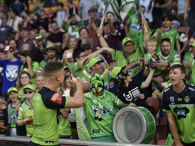 Canberra Raiders fans celebrate a rare victory. Picture: Albert Perez/Getty Images