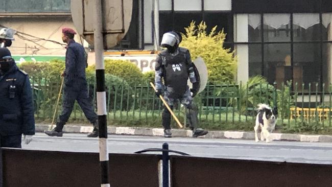 Riot police outside Kathmandu’s Tribhuvan International Airport on Tuesday March 24. Picture: Anthony Keane