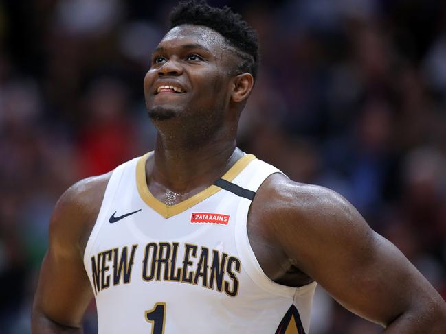 NEW ORLEANS, LOUISIANA - JANUARY 26: Zion Williamson #1 of the New Orleans Pelicans reacts against the Boston Celtics during the second half at the Smoothie King Center on January 26, 2020 in New Orleans, Louisiana. NOTE TO USER: User expressly acknowledges and agrees that, by downloading and or using this Photograph, user is consenting to the terms and conditions of the Getty Images License Agreement.   Jonathan Bachman/Getty Images/AFP == FOR NEWSPAPERS, INTERNET, TELCOS & TELEVISION USE ONLY ==