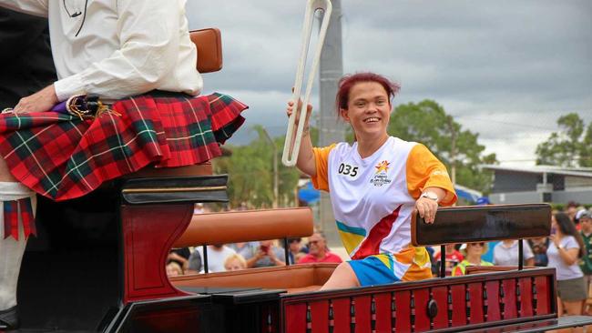 ARRIVING IN STYLE: Batonbearer Claire Keefer rides into the Gatton Showgrounds on a carriage. Picture: Dominic Elsome