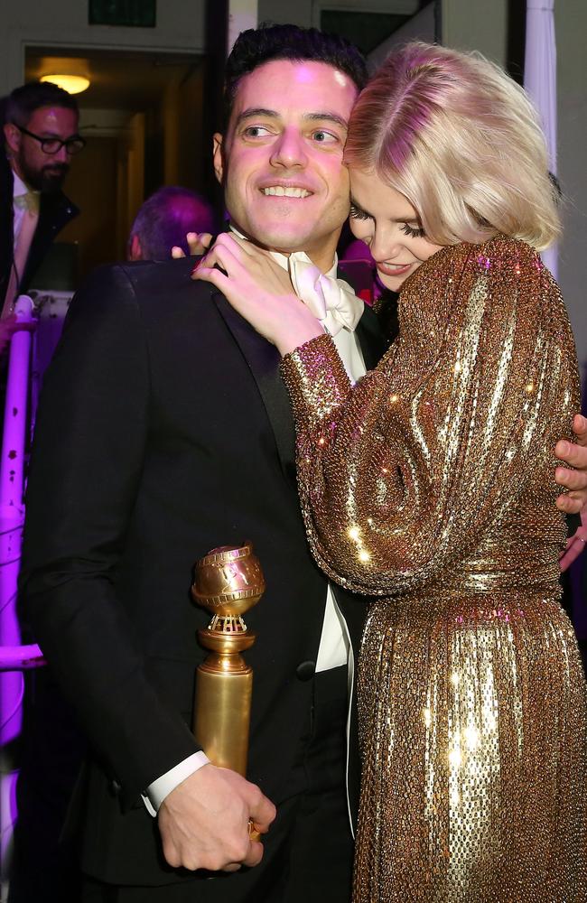 Cute couple! Bohemian Rhapsody star Rami Malek and co-star Lucy Boynton celebrated his win at the Fox and Hulu after-party. 