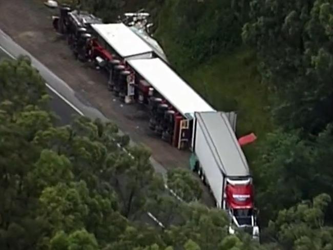 The aftermath of the B-double truck rollover at Gaven on the Gold Coast. Picture: 9 News Gold Coast