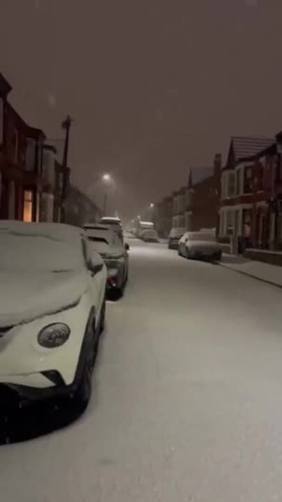 Liverpool Row Houses Snowed Under as UK Grapples With Severe Weather