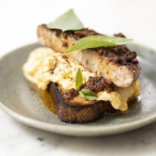 The Stock Market’s tasty and hearty Cumberland sausage dish is served with scrambled eggs, house-made Sri Lankan-inspired burnt onion sambal and Pigeon Whole heritage wheat sourdough. Picture: EDDIE SAFARIK