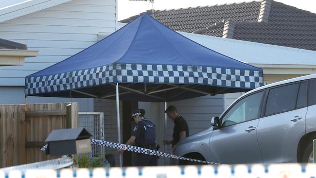 Police officers at a murder suicide at Pimpama - a DV incident can quickly escalate.