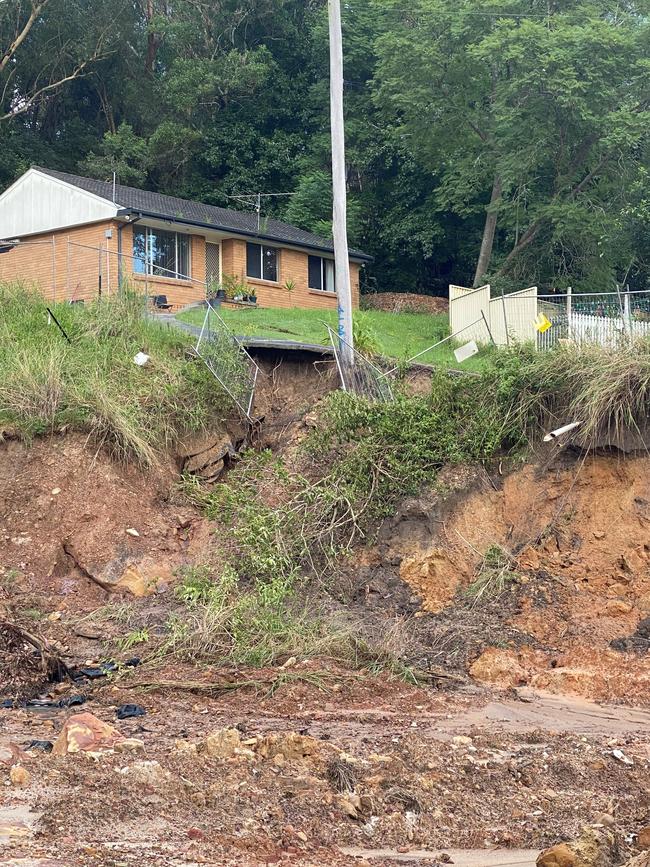 The couple’s driveway fell into the lot in 2021. Picture: Supplied
