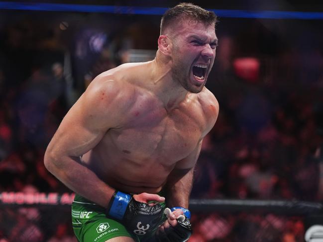 LAS VEGAS, NEVADA - JULY 08: Dricus Du Plessis of South Africa reacts after his knockout victory over Robert Whittaker of New Zealand in a middleweight fight during the UFC 290 event at T-Mobile Arena on July 08, 2023 in Las Vegas, Nevada. (Photo by Cooper Neill/Zuffa LLC via Getty Images)