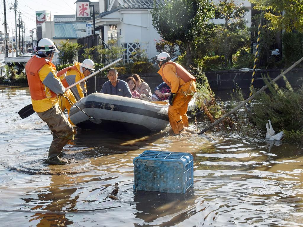 At least 19 people are dead and 16 missing, officials said after powerful Typhoon Hagibis slammed into Japan, unleashing “unprecedented” and flooding. Picture: AFP/Japan OUT