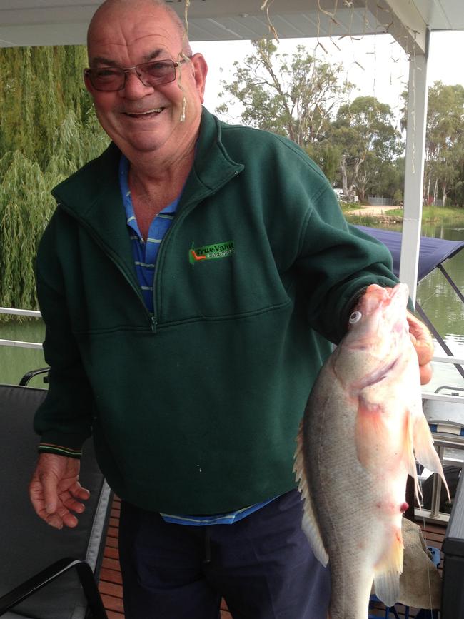 Mal Todd on his River Murray houseboat Antigone in 2015. Picture: Supplied by family