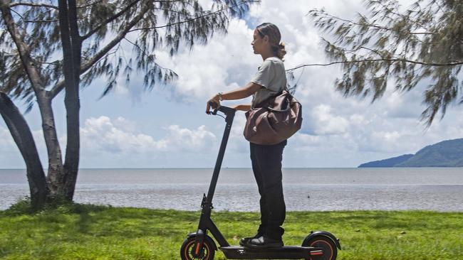 Dikshya Gurung rides her e-scooter on the Cirns Esplanade. Picture: Brian Cassey