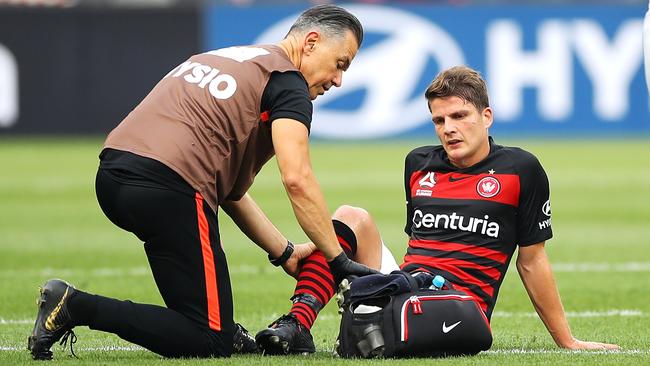 Pirmin Schwegler receives attention during the draw with Brisbane. Picture: Getty Images