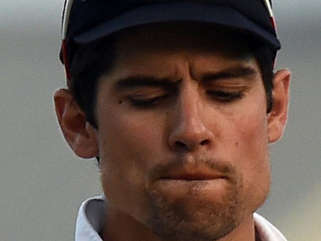 England's cricket team captain Alastair Cook reacts as he leaves the field after being defeated during day three of the final match of a three-match Test series between England and West Indies at the Kensington Oval Stadium in Bridgetown on May 3, 2015. West Indies defeated England by 5 wickets to draw the series 1-1. AFP PHOTO/JEWEL SAMAD