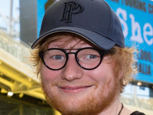 British singer-songwriter Ed Sheeran leaves a Q&A session with the media at Optus Stadium in Perth on Thursday, March 1, 2018. Ed Sheeran starts his Australian and New Zealand tour on Friday, March 2, at Optus Stadium in Perth. (AAP Image/Richard Wainwright) NO ARCHIVING