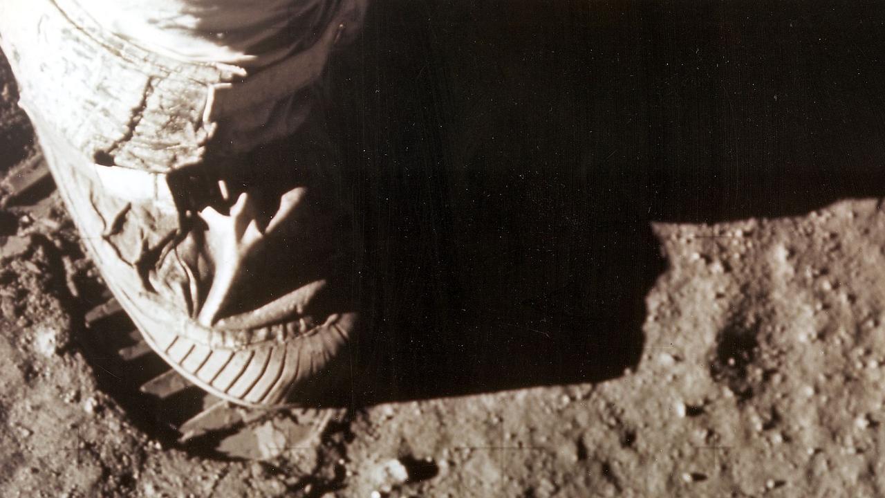 Commander Neil Armstrong's right foot leaves a footprint in the lunar soil. Picture: AFP/NASA