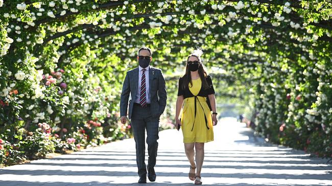 Racegoers arrive during the 2021 Melbourne Cup Day at Flemington Racecourse. (Photo by Quinn Rooney/Getty Images)