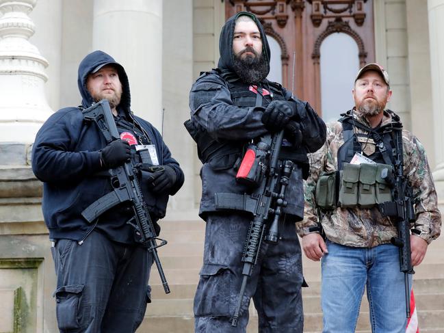 Michael Null (left) takes part in the American Patriot Rally in April. Picture: AFP