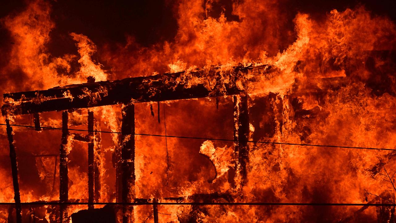 A house is engulfed in flames from the wind-driven Palisades Fire in Pacific Palisade. Picture: Robyn Beck / AFP