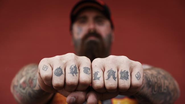 Bandido ‘Twitch’ has OUTLAW inked on his knuckles. Picture: Sam Ruttyn