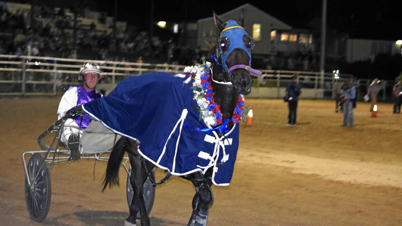 Noel Parrish and Its You Not Me doing a victory lap after winning the Ray Bunch Machinery Cantor Cup at the Warwick Showgrounds on Friday night. Picture: Mavis March