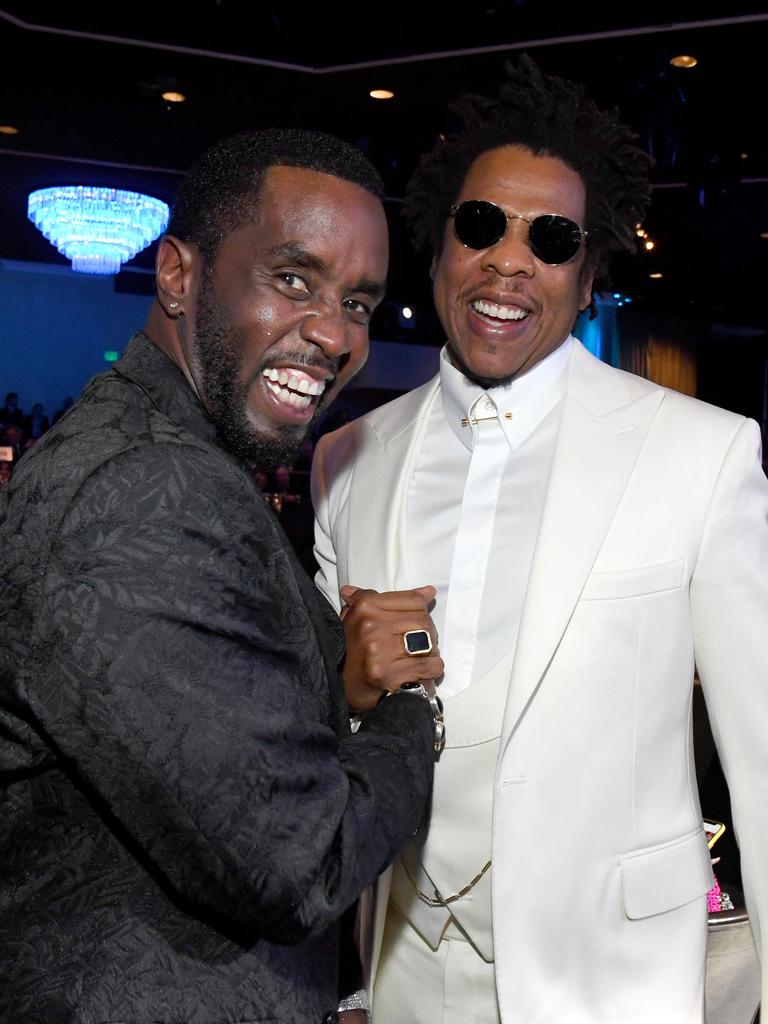 Sean 'Diddy' Combs and Jay-Z attend a party in 2020. (Photo by Kevin Mazur/Getty Images for The Recording Academy)